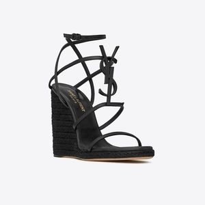 SAINT LAURENT CASSANDRA WEDGE ESPADRILLES IN LEATHER.